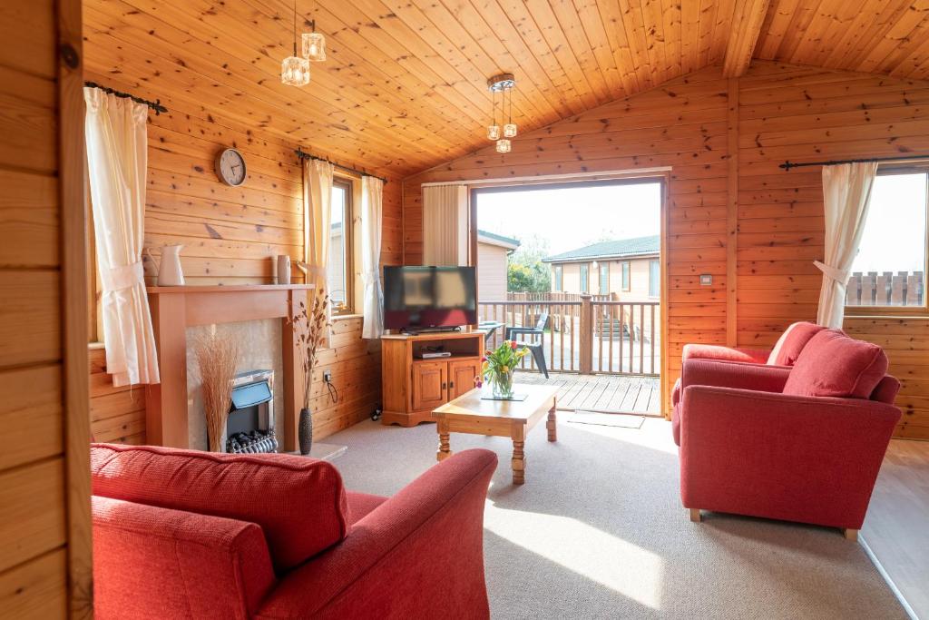 TV a/nebo společenská místnost v ubytování 8 Ocean View Lodge - 3 Bed-Sleeps 6-TJS8OV