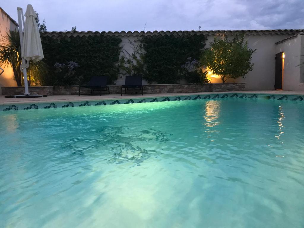 Photo de la galerie de l'établissement Villa Mediterranea Clim, Piscine, Cuisine d'été Pérols, à Pérols