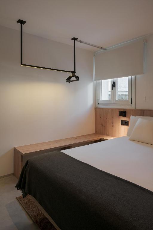 Posteľ alebo postele v izbe v ubytovaní Moderno Apartamento San Antoniño Hapartments