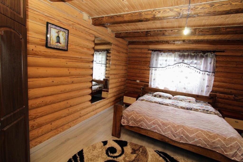 Postel nebo postele na pokoji v ubytování Фазенда "Змерега"