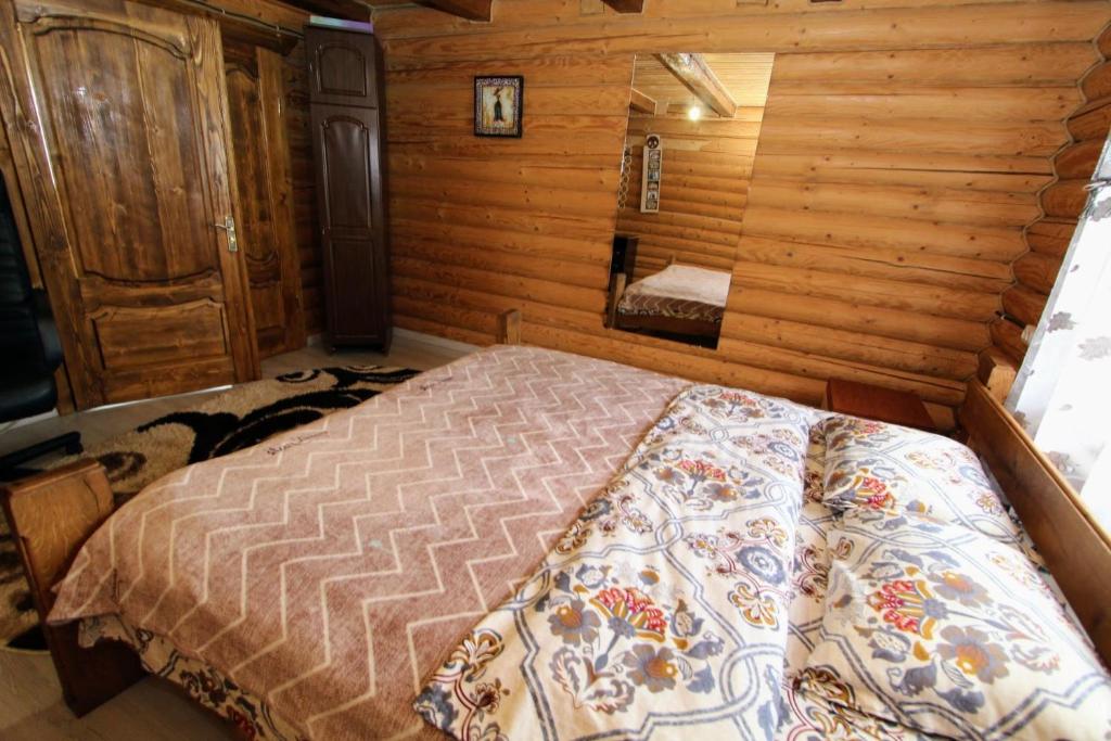 Postel nebo postele na pokoji v ubytování Фазенда "Змерега"