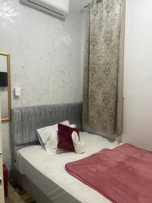 Postel nebo postele na pokoji v ubytování New One Hotel