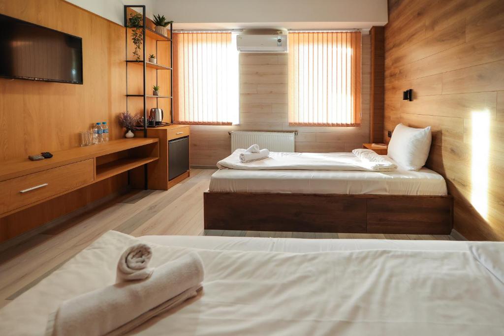 Postel nebo postele na pokoji v ubytování Family Hotel Gotse Delchev