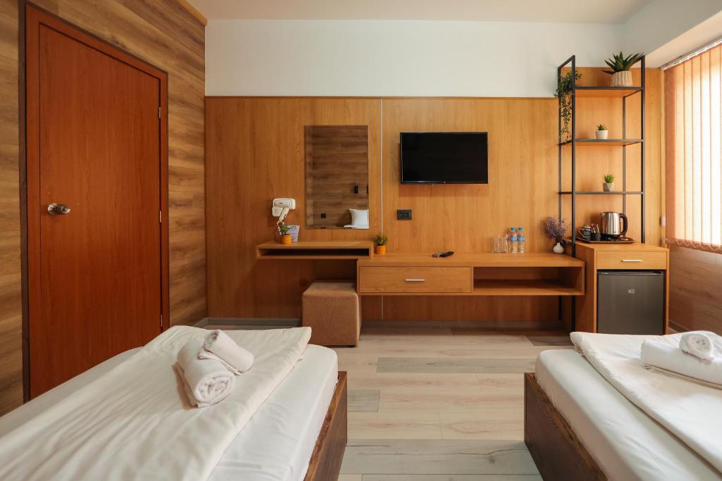 TV a/nebo společenská místnost v ubytování Family Hotel Gotse Delchev