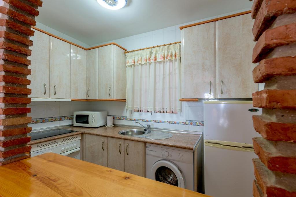 Kuchyň nebo kuchyňský kout v ubytování Apartamento Sibarys Ladera del mar