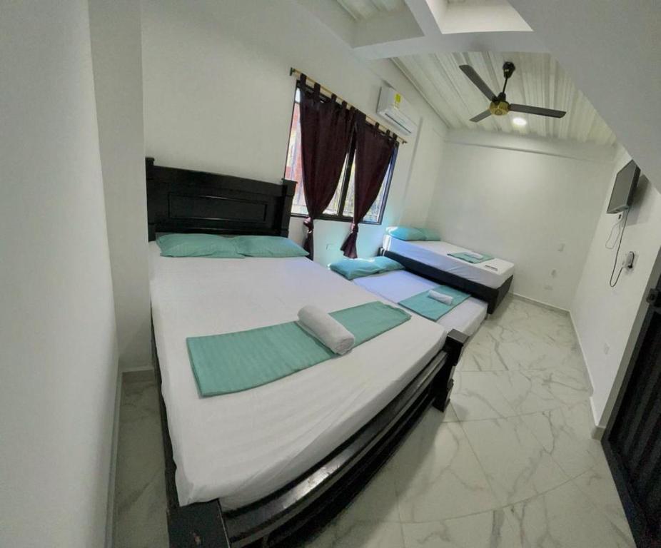 Postel nebo postele na pokoji v ubytování APARTAMENTO vista VERDE DORADAL