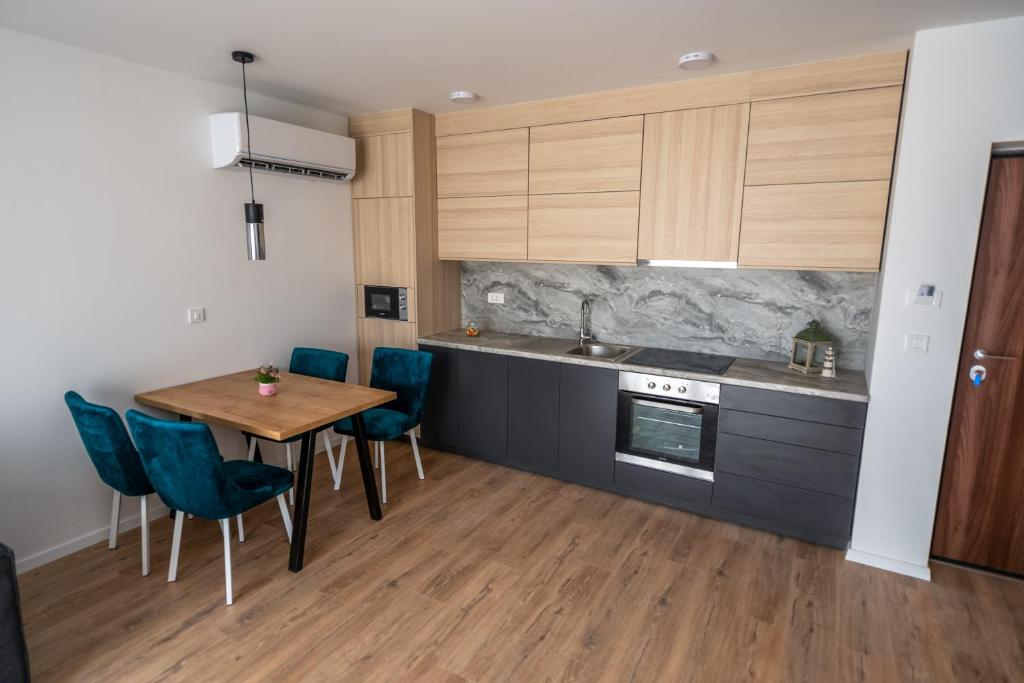 Kuchyň nebo kuchyňský kout v ubytování Hotel MM Residence