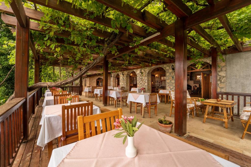 A restaurant or other place to eat at Watermill Villa & Hotel Faralya