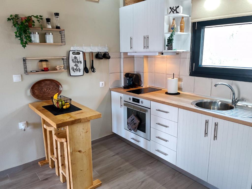 Kuchyň nebo kuchyňský kout v ubytování Gardy rooms