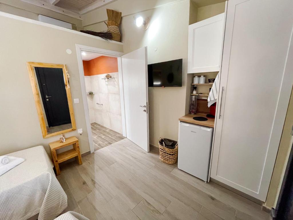 Kuchyň nebo kuchyňský kout v ubytování Gardy rooms