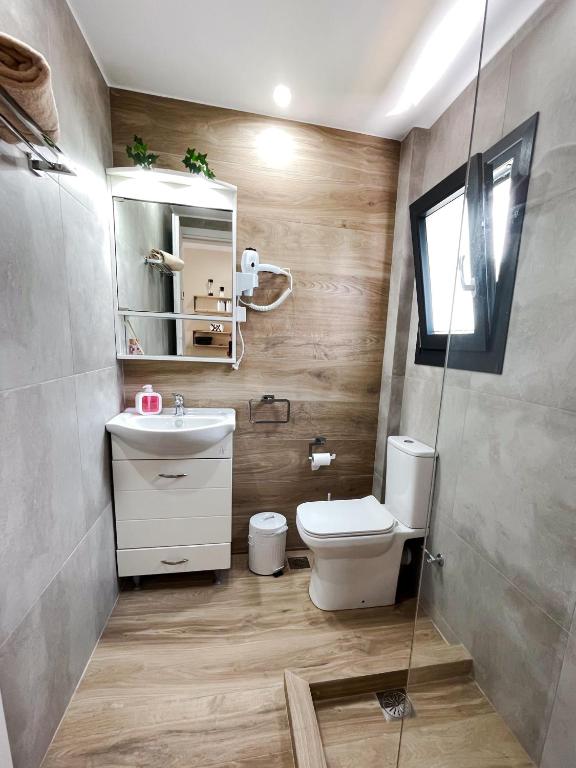 Koupelna v ubytování Gardy rooms