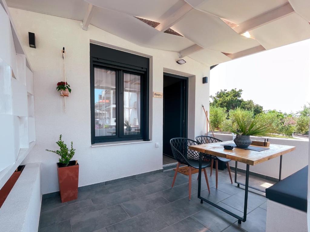 Fotografie z fotogalerie ubytování Gardy rooms v destinaci Nea Kallikratia
