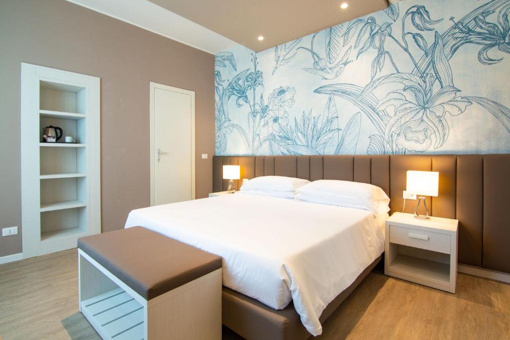 Postel nebo postele na pokoji v ubytování Park Hotel Pineta