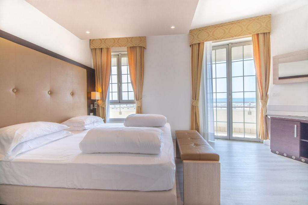 Postel nebo postele na pokoji v ubytování Park Hotel Pineta