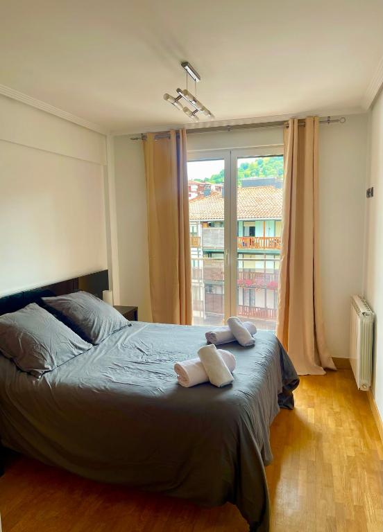 Postel nebo postele na pokoji v ubytování Duplex CARDELLY