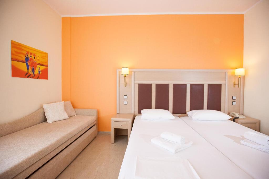 Postel nebo postele na pokoji v ubytování Hotel Kanali