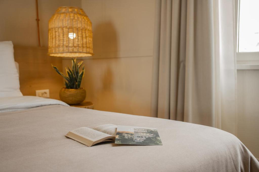 Postel nebo postele na pokoji v ubytování room Select Via Veneto