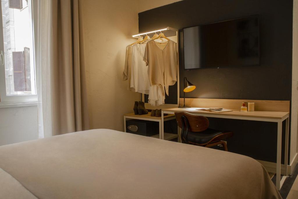 Postel nebo postele na pokoji v ubytování room Select Via Veneto