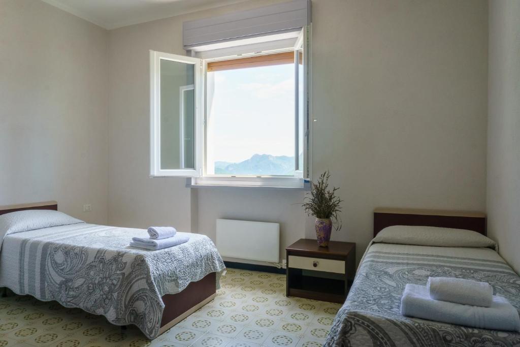 Postel nebo postele na pokoji v ubytování Albergo ristorante Payarin