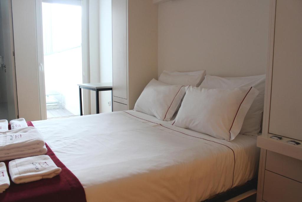 Postel nebo postele na pokoji v ubytování ÍSIS Guest House