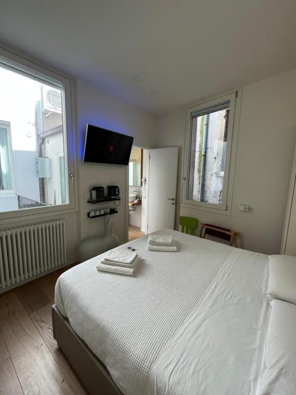 Postel nebo postele na pokoji v ubytování B&B Casa Diaz