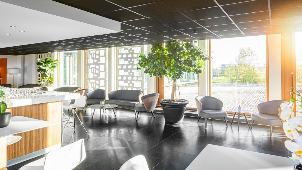 Posezení v ubytování Holiday Inn Express Utrecht - Papendorp by IHG