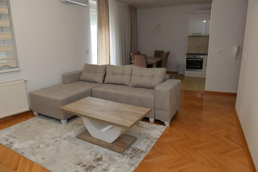 Kuchyň nebo kuchyňský kout v ubytování Dobi Apartmani WING 7