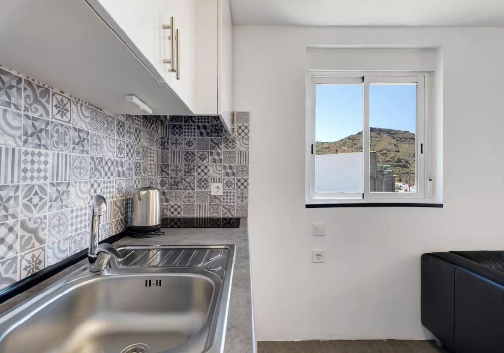 Kuchyň nebo kuchyňský kout v ubytování Yinfa 1 Sunset Apartment
