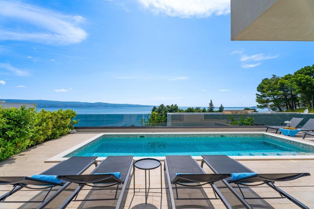 Luxury, seafront Villa IVAN with heated pool only 100m from beach