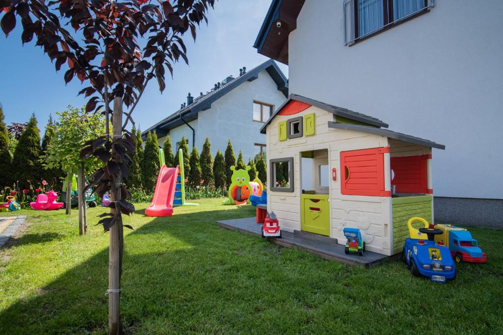 Vonkajšia záhrada v ubytovaní Domki Jelonek - Całoroczne, ogrzewane, klimatyzowane