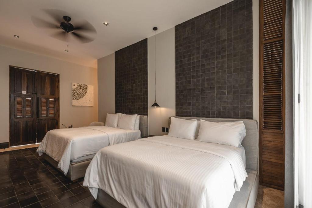 Postel nebo postele na pokoji v ubytování Hotel Sutuk