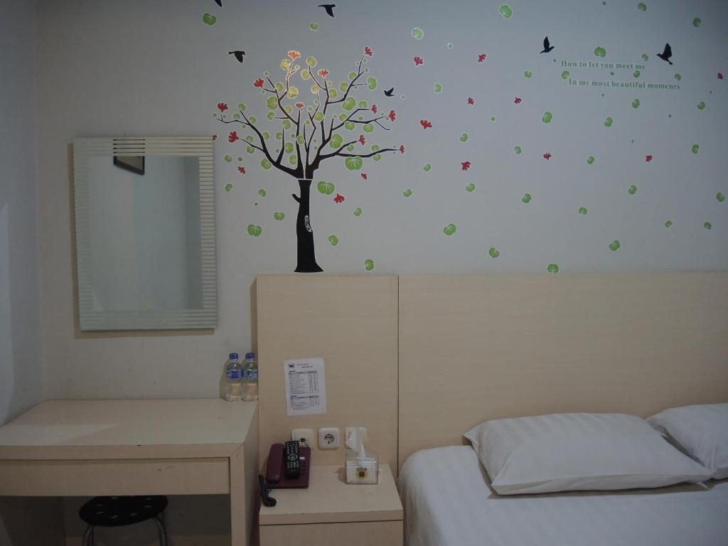 Postel nebo postele na pokoji v ubytování SWK 95 Hotel