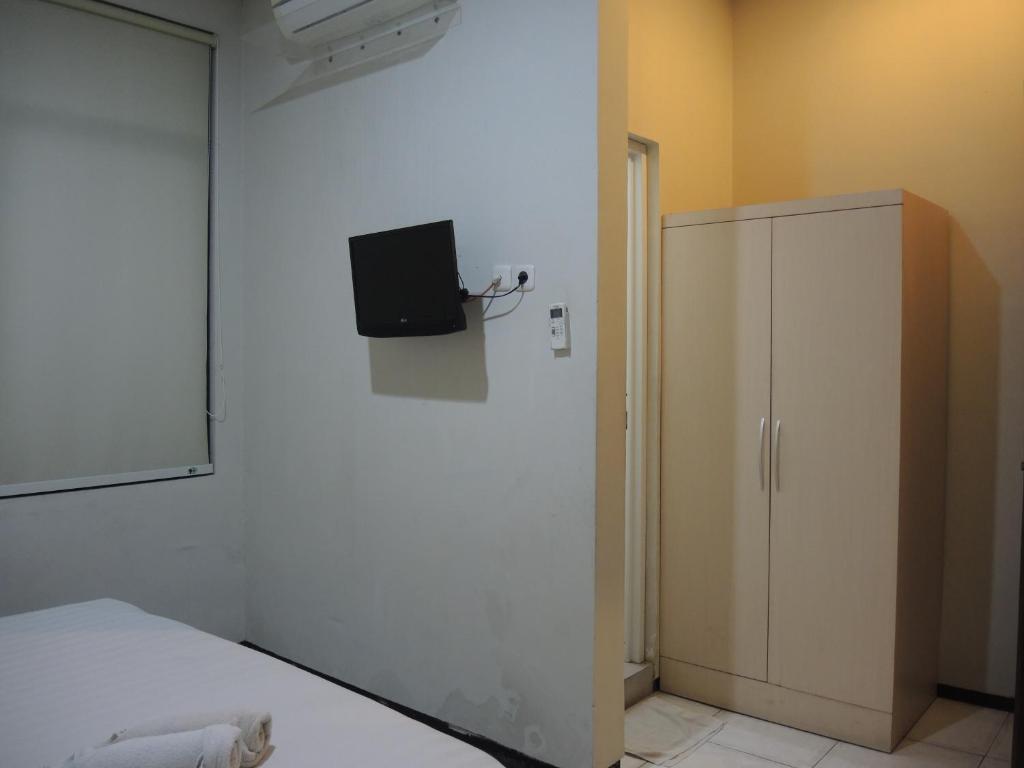 Postel nebo postele na pokoji v ubytování SWK 95 Hotel
