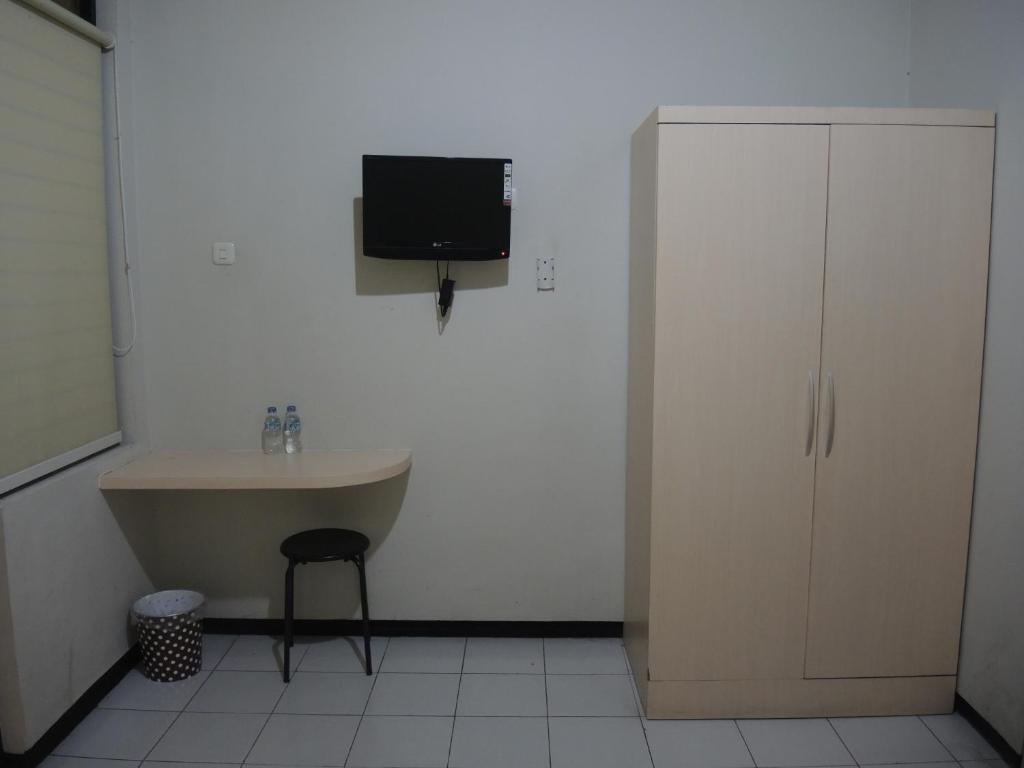 TV a/nebo společenská místnost v ubytování SWK 95 Hotel