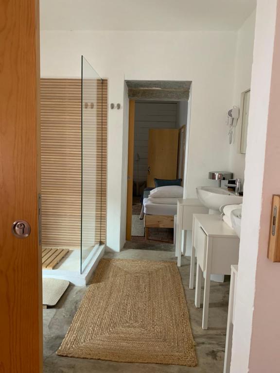 Postel nebo postele na pokoji v ubytování Slowly-Com Vagar