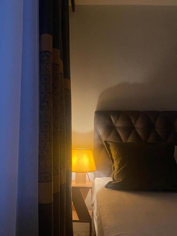 Postel nebo postele na pokoji v ubytování ZANI Hostel