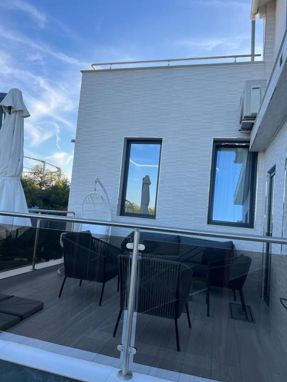 Balkón nebo terasa v ubytování DeLuxe House Valencia