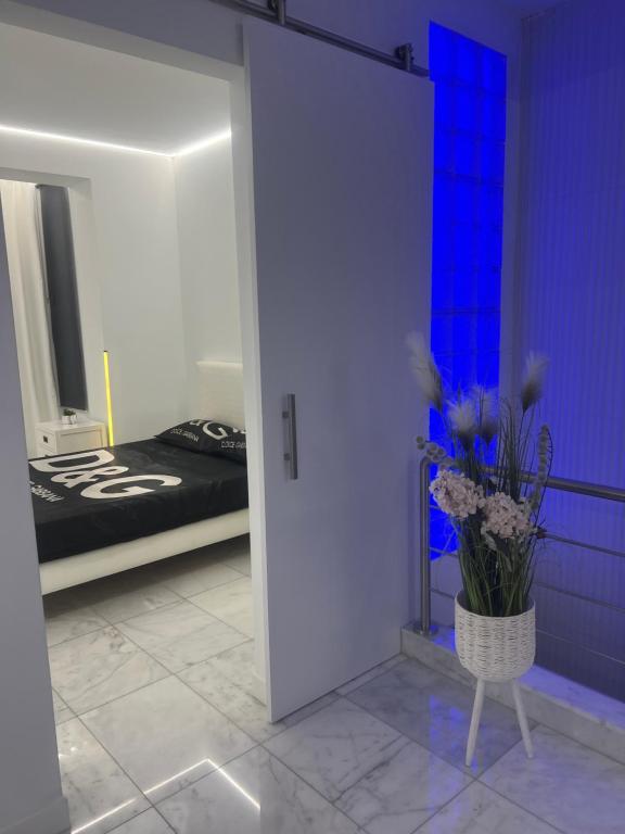 Postel nebo postele na pokoji v ubytování DeLuxe House Valencia