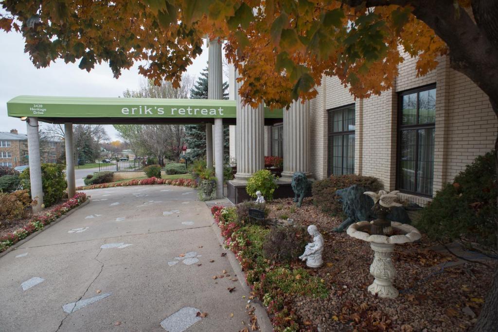 a building with a sign that reads ellis refuge at Erik's Retreat in Edina