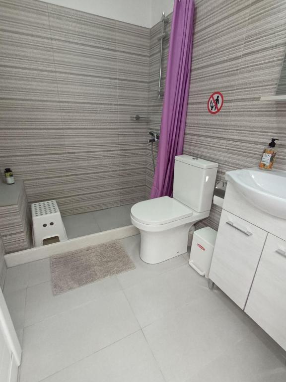 Koupelna v ubytování Nikolas home