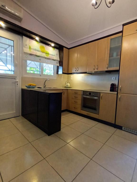 Kuchyň nebo kuchyňský kout v ubytování Nikolas home