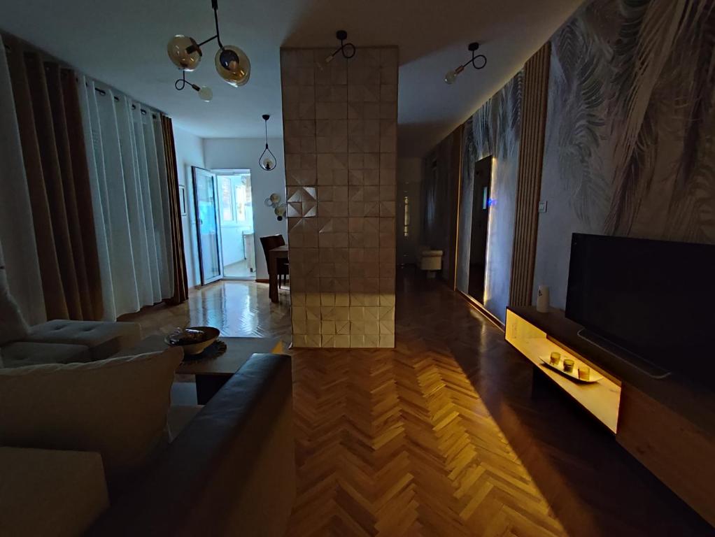 TV a/nebo společenská místnost v ubytování High T
