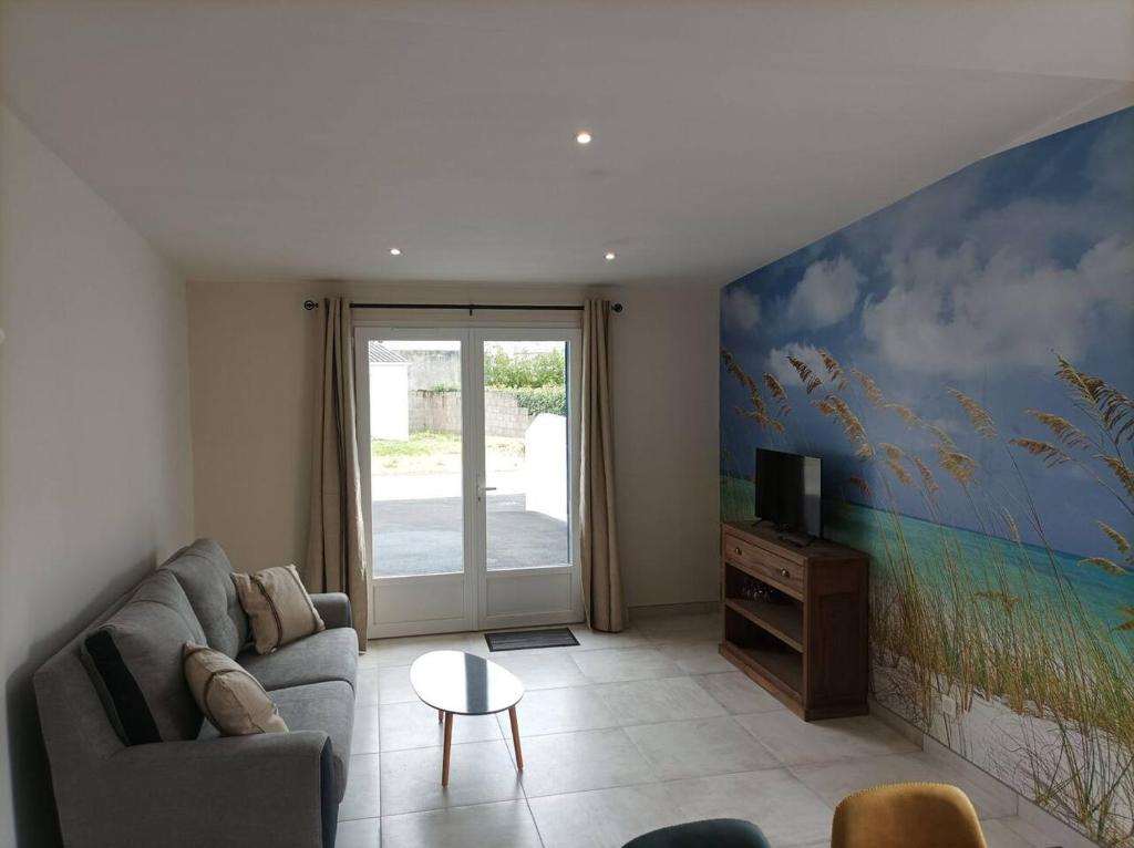 Χώρος καθιστικού στο La Maisonnette aux volets bleus