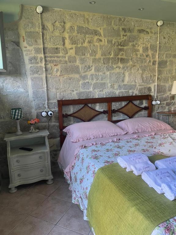 Postel nebo postele na pokoji v ubytování La Lavandula