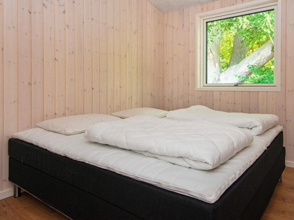 Postel nebo postele na pokoji v ubytování Holiday home Glesborg LXXXIX