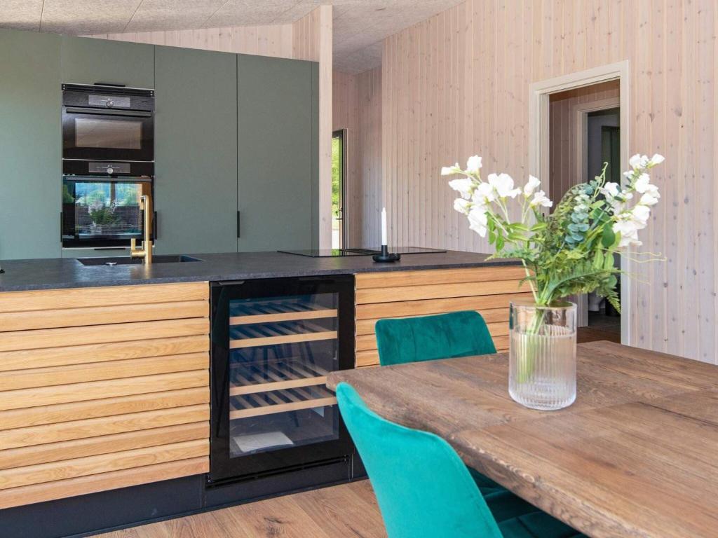 Kuchyň nebo kuchyňský kout v ubytování Holiday home Glesborg LXXXIX