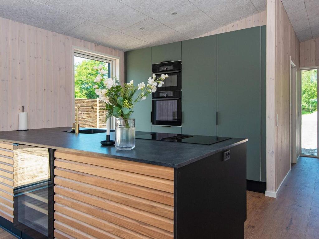 Kuchyň nebo kuchyňský kout v ubytování Holiday home Glesborg LXXXIX