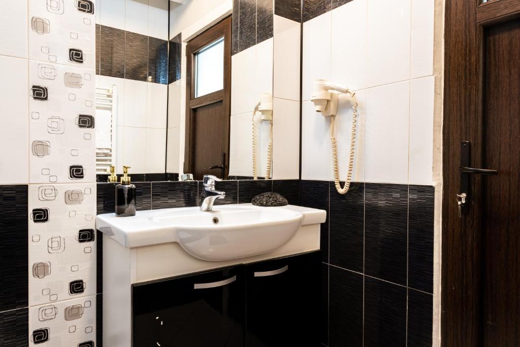Koupelna v ubytování Hotel ENZO