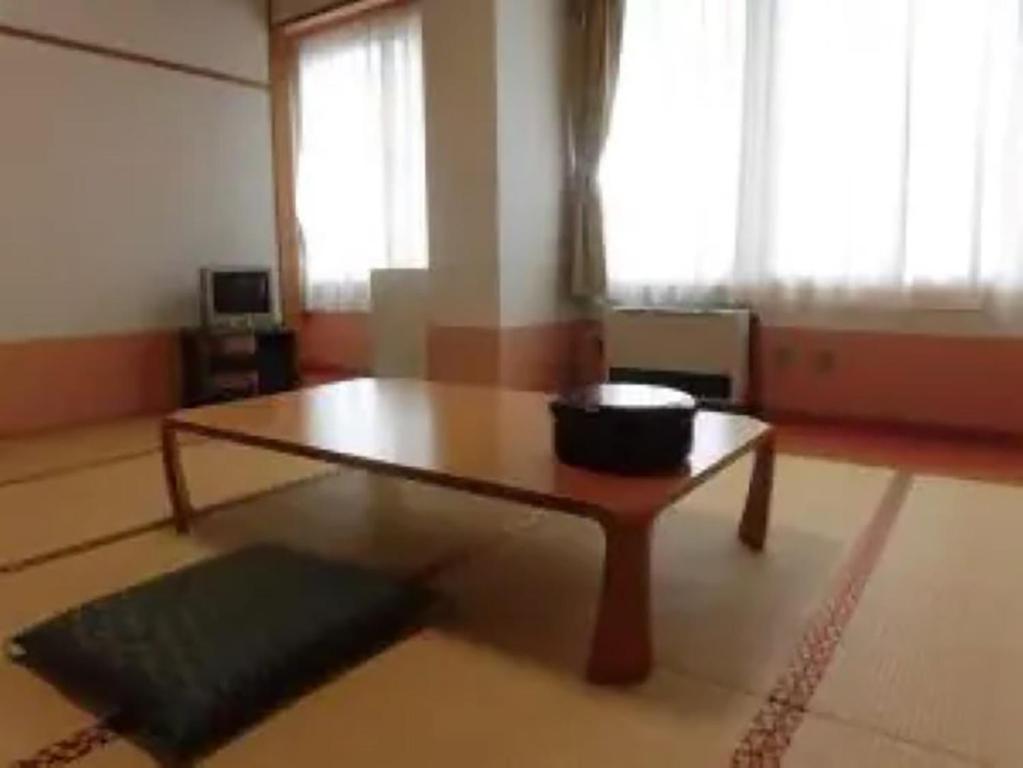 TV a/nebo společenská místnost v ubytování Asakusa Sanso