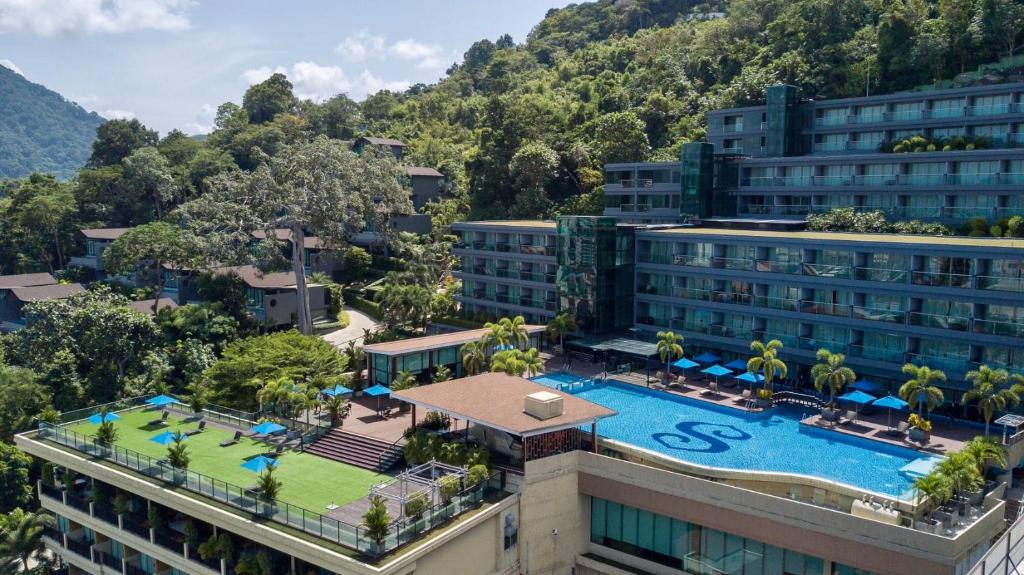 an aerial view of a hotel with a swimming pool at The Senses Resort & Pool Villas - SHA Plus in Patong Beach